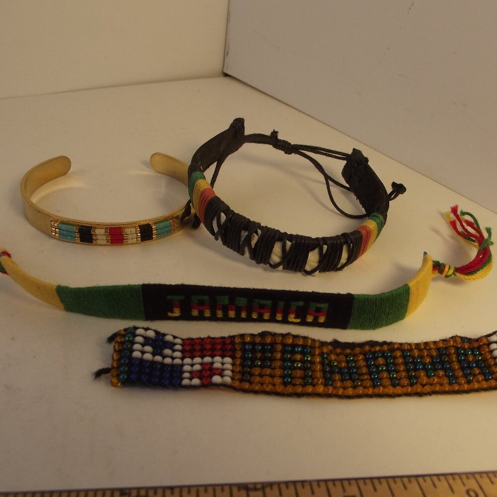 Lot of 4 Tourist Bracelets Jamaica, Panama, Sharks Teeth, Gold Tone Beaded Cuff